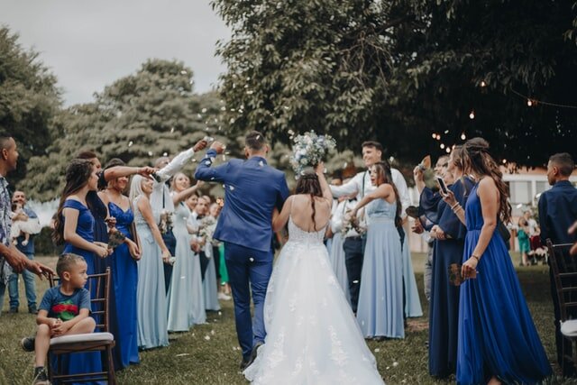 Even though hot weather is a challenge you need to face, there are many easy ways to keep your guests cool at an outdoor summer wedding.
