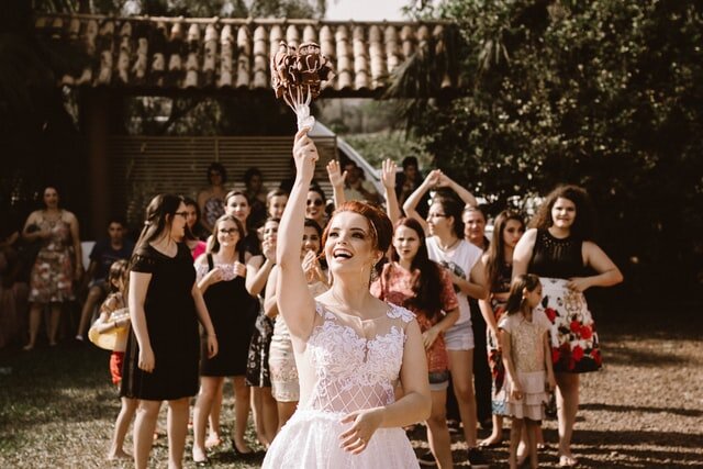 Lighter fabric choices are key when it comes to summer wedding attire.