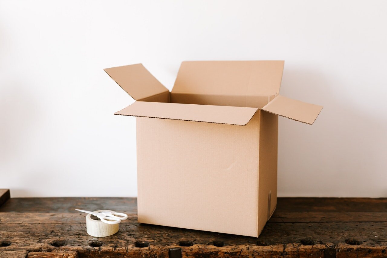 Put away the duplicates and save them for later, being careful to avoid damage if the items are fragile.