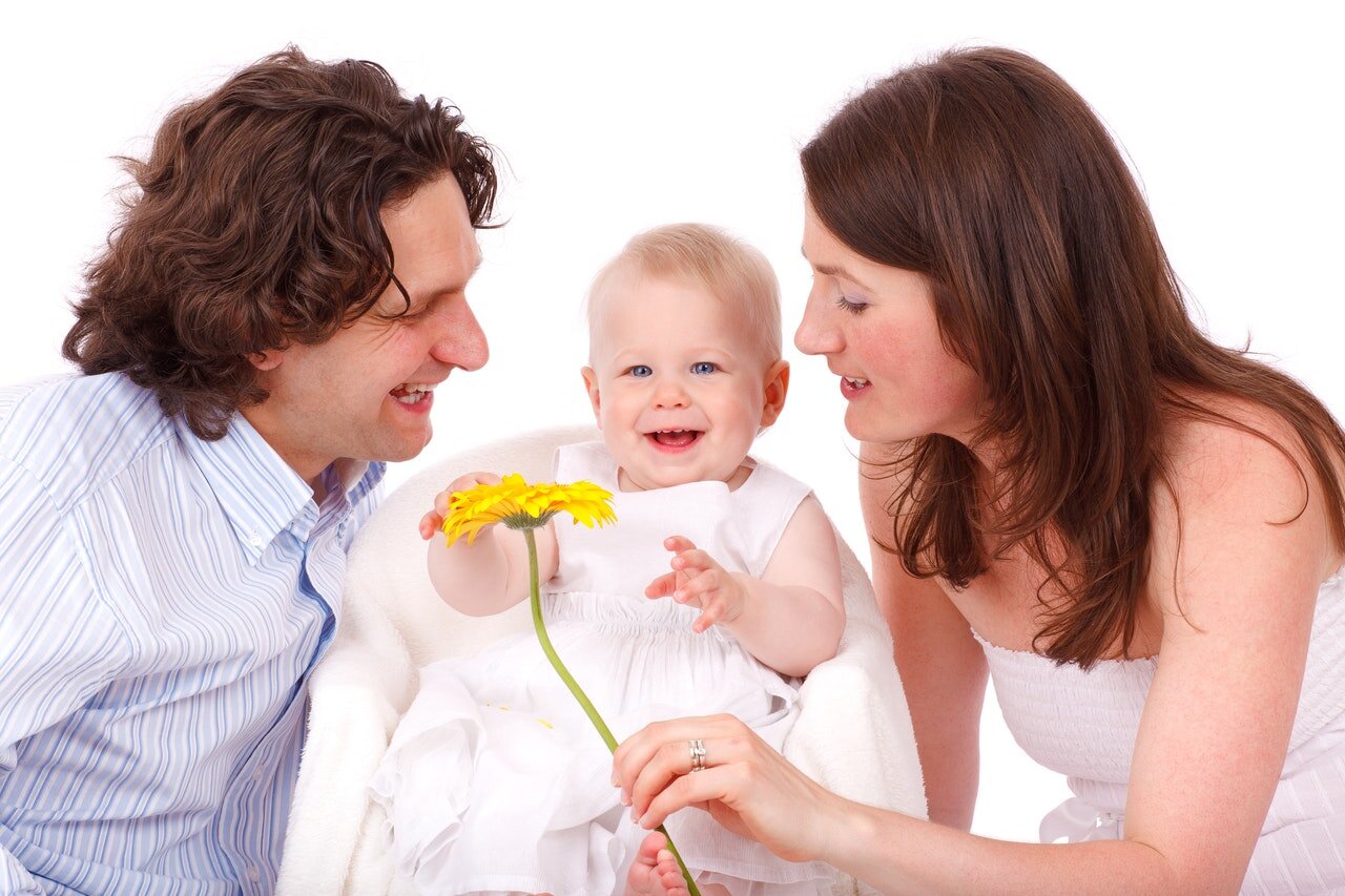 engaged couple with baby.jpg
