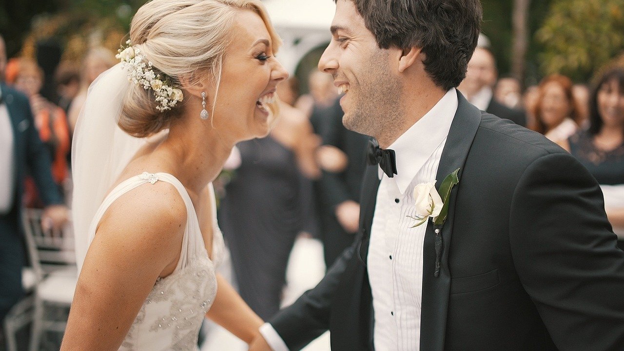 If you hire a wedding planner, you’ll be able to focus on your partner and enjoy your wedding day to the fullest. Photo by Artistic Films via Pixabay