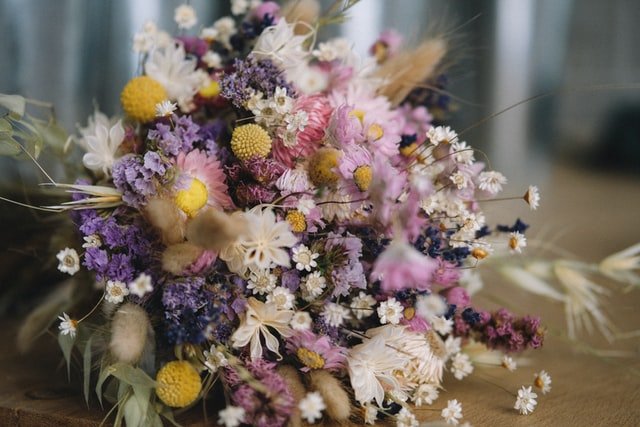 wedding bouquet with purple, lavender, and white florals